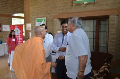 Ron Pitamber and Rajeev Srivastava in discussion with Radhanath Swami