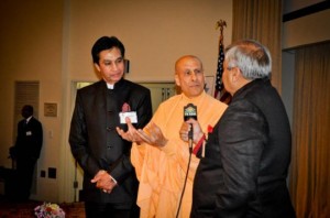 Radhanath Swami with Dr Navin Mehta and Rashmikant Kamdar, main sponsor for the event. 